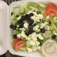 Greek Salad · Served with feta cheese, tomatoes, onions, green peppers and olives.