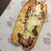 Federal Hill Sub · Spicy Italian sausage, roasted red peppers, grilled onions, provolone cheese, and Ronzio's o...