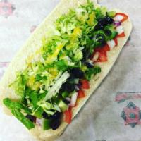 Veggie Sub · Lettuce, tomato, onions, green peppers, olives, and drizzled with oil and vinegar.