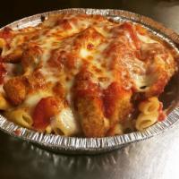 Chicken Parm · Ziti topped with breaded chicken, sauce and cheese. Served with a small side salad and a sid...