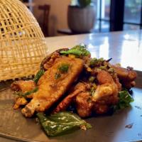 5 Spice Fried Chicken Wings · 5 pieces. Garlic, onion, peppers, and crispy basil.