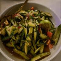 Laos Style Cucumber Salad · Persian cucumber, tomato, sweet crab, anchovy in spicy lime sauce.