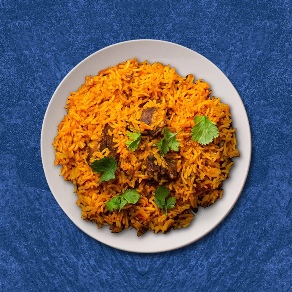 Lamb Bayside Biryani · Classic aromatic lamb dish with cubes of tender lamb, fragrant with saffron garnished with raisins and cashews
