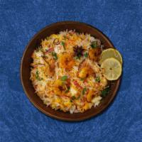 Shrimp Bayside Biryani · Aromatic rice flavored with shrimp, fragrant with saffron, garnished with raisins and cashews
