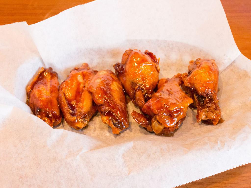 8 Wings · Served with 1 sauce.
