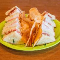 Traditional Club Sandwich · Our high-rise, triple decker with turkey, ham, American cheese, bacon, lettuce, tomato, and ...
