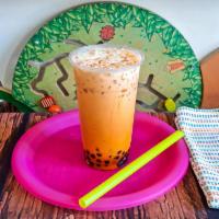 Thai Tea · Made with brewed thai tea and half and half, natural milk substitutes are also available.