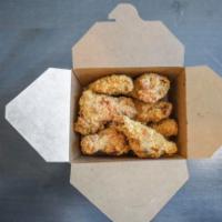 Chicken Wings · Perfectly battered and fried large wings, 6 pieces per order