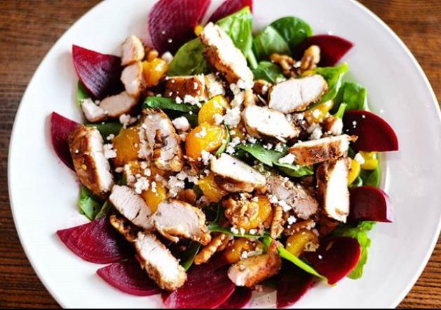 Roasted Beets Salad · Baby spinach, roasted red beets, roasted golden beets, goat cheese, mandarin oranges and sliced almonds.