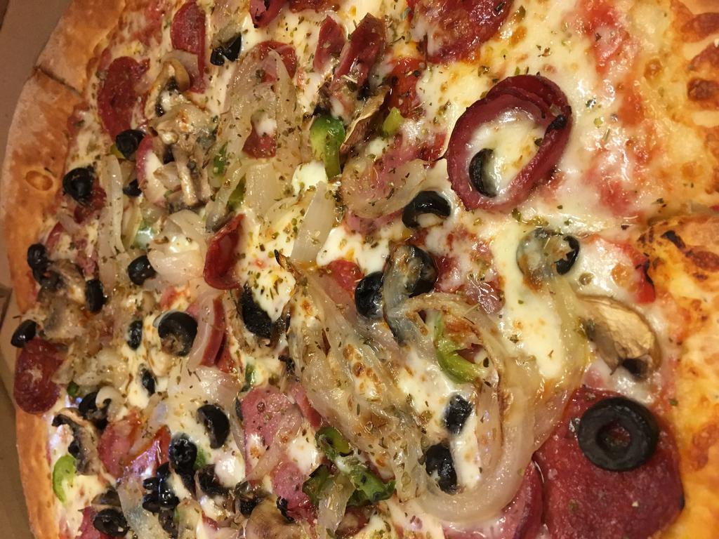 Supreme Pizza · Mozzarella, pepperoni, mushrooms, green peppers, caramelized onions, Italian sausage, black olives with tomato sauce.
