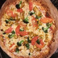 Spicy Chicken Pizza · Buffalo spicy sauce, mozzarella, chicken breast, green peppers, sun dried tomatoes and red o...