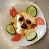 Hummus Dip · Pureed chickpeas with tahini and garlic. 