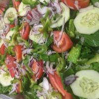 Greek Salad · Lettuce, cucumber, tomato, red onion, green pepper, feta cheese and kalamata olives. 