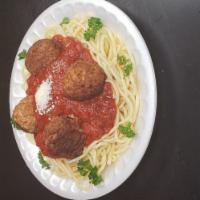 Spaghetti and Meatballs · Meatballs, spaghetti, marinara sauce and Parmesan cheese over pasta. Served with a side of g...