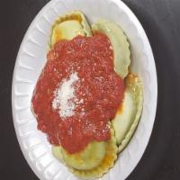 Spinach Ravioli · Ravioli's stuffed with spinach, herbs and ricotta cheese in our marinara sauce. Served with ...