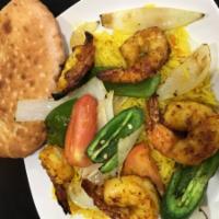 Shrimp Kabob Platter · Seasoned and grilled jumbo shrimp with lemon. Served with rice, salad, grilled vegetables, c...