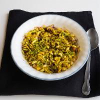 Bhelpuri · Puffed rice with tamarind chutney, and vegetables.