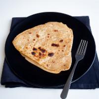 Paratha · 2 pieces. Layered, flaky lightly-fried bread.