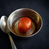 Gulab Jamun · 2 pieces. Milk-solid based sweet marinated in rose syrup.