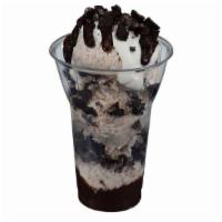 Oreo® Layered Sundae · 3 scoops of our Oreo® cookies 'n cream ice cream layered with hot fudge and chopped Oreo® co...