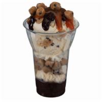 Chocolate Chip Cookie Dough Layered Sundae · Three scoops of Chocolate Chip Cookie Dough Ice Cream with layers of hot fudge and cookie do...