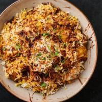 Chicken Biryani · Traditional Indian rice dish with succulent pieces of chicken, cooked in a blend of spices