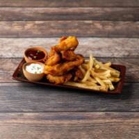Chicken Tenders · Beer-battered and golden fried chicken tenders with french fries, sides of BBQ sauce and cre...