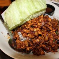 Chicken Lettuce Wraps · Minced chicken meat is served with a 4 pieces of lettuce and hoisin sauce. Wrap it, dip it, ...