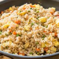 Fried Rice · A playful toss of rice made with carrots, peas, bean sprouts, eggs and onions. 