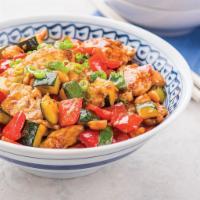 Kung Pao Chicken · Zucchini, onions, baby corn, and a chicken come flying together in a spicy Kung Pao sauce. T...