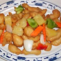 Sweet and Sour Chicken · A favorite battered chicken classic. The dish is topped with pineapples, bell peppers, onion...