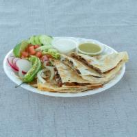 Quesadilla · Flour tortilla with cheese, meat, red onions, cilantro, lettuce, and hot or mild salsa. Sour...