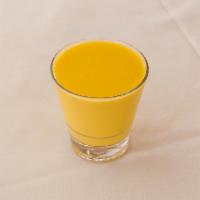 Mango Lassi · Yogurt based mango drink.