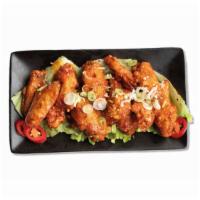 Hot Chicken Wings · Sticky and spicy wings. Extra Spicy.