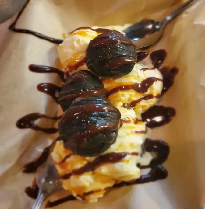 Dirt Ball · 4 pieces. Served with vanilla ice cream drizzled with chocolate and caramel.