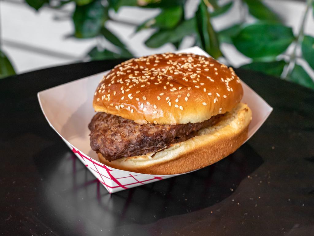 Double Angus Beef Burger · Well done. 100% Angus beef with your choice of toppings.