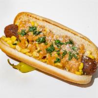 Elote Frank · Chipotle sausage served on a toasted bun, topped with sweet corn, chipotle mayo, Cotija chee...