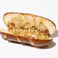 Frankwurst · Bratwurst sausage topped with onions, sauerkraut, and stone ground mustard on a pretzel bun....