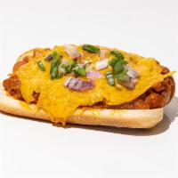 Chili Cheese Frank · Jumbo frank smothered in ground pork chili sauce, topped with cheddar cheese and green onion...