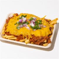 Chili Cheese Fries · Signature house chili, topped with cheddar cheese and green onions. (Vegan)