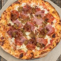 Meaty Beast Pizza · Pepperoni, sausage, bacon & ham. Hand-tossed dough, homemade pizza sauce recipe, 100% whole ...