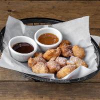 Cinnamon Sugar Zeppole · with chocolate and caramel dipping sauce