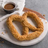 Sweet Almond Pretzel · This sweet yet salty pretzel is baked fresh and topped with our own toasted almond crunch. A...
