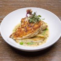 Chicken Vesuvio · A traditional Chicago favorite! White wine, rosemary, Vesuvio sauce with peas. Served over V...