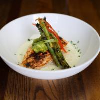 Blackened Salmon · Wild caught blackened salmon served over steamed rice with a lemon cream sauce. Served with ...