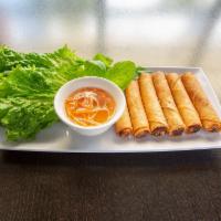 A1. Egg Roll (6 rolls) -  Chả Giò · Deep fried egg rolls mixed of vegetables, pork and shrimp served with house fish sauce or sw...