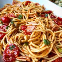 Sandra's Super Spaghetti Salad · 12 oz Spaghetti topped with cherry tomatoes, green onions, summer seasoning, and cheddar che...