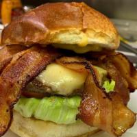 BBQ Bacon Cheddar Burger · Beef patty dipped in James River BBQ Sauce, melted cheddar cheese & Bacon