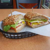 Windmill Turkey Sandwich · Roasted turkey on multi-grain ciabatta, with jack cheese, pickles and house-made mayo-based ...