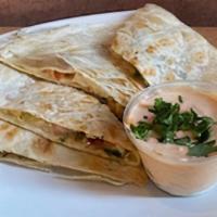 Berkeley Cheese Quesadilla · Grilled 3 cheese blend, tomato & diced onions with Mild spicy Signature Sauce on Tortilla.